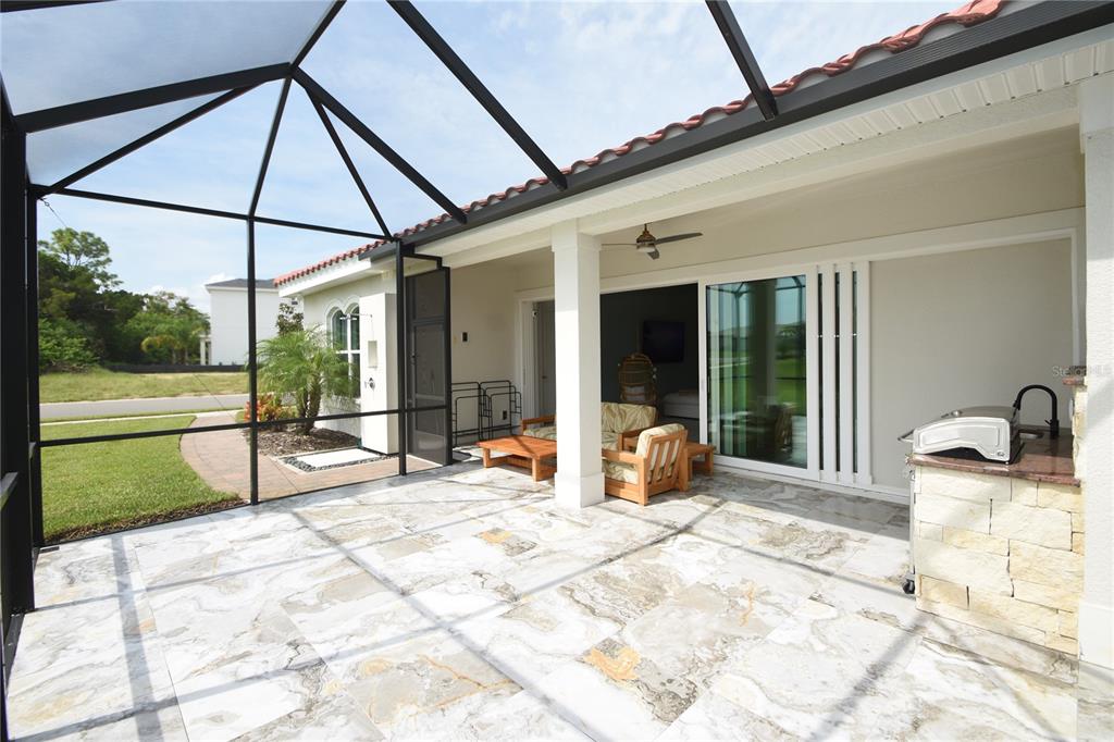 114 Del Palma Drive Palm Coast, FL 32137 - Photo 25 of 63 a view of a house with backyard and sitting area