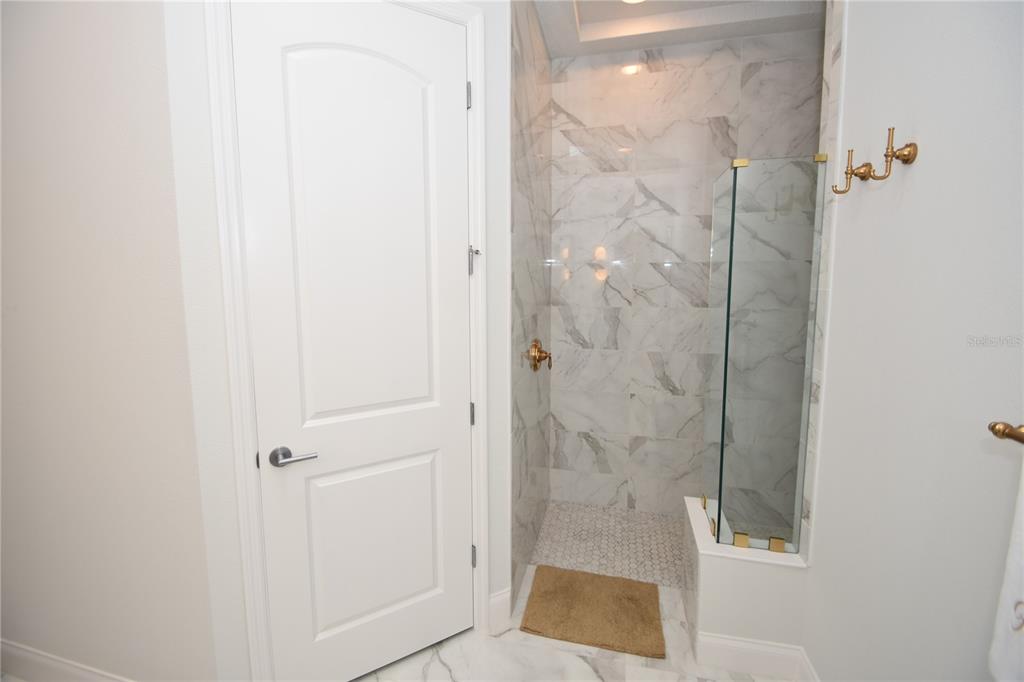 114 Del Palma Drive Palm Coast, FL 32137 - Photo 32 of 63 a bathroom with a shower