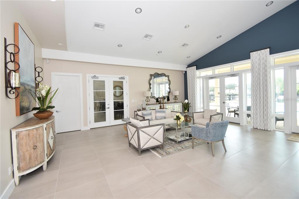 114 Del Palma Drive Palm Coast, FL 32137 - Photo 55 of 63 a living room with furniture large window and wooden floor