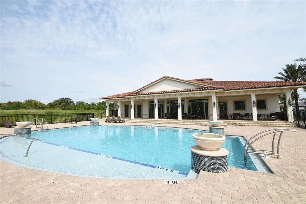 114 Del Palma Drive Palm Coast, FL 32137 - Photo 62 of 63 a view of a house with pool table and chairs