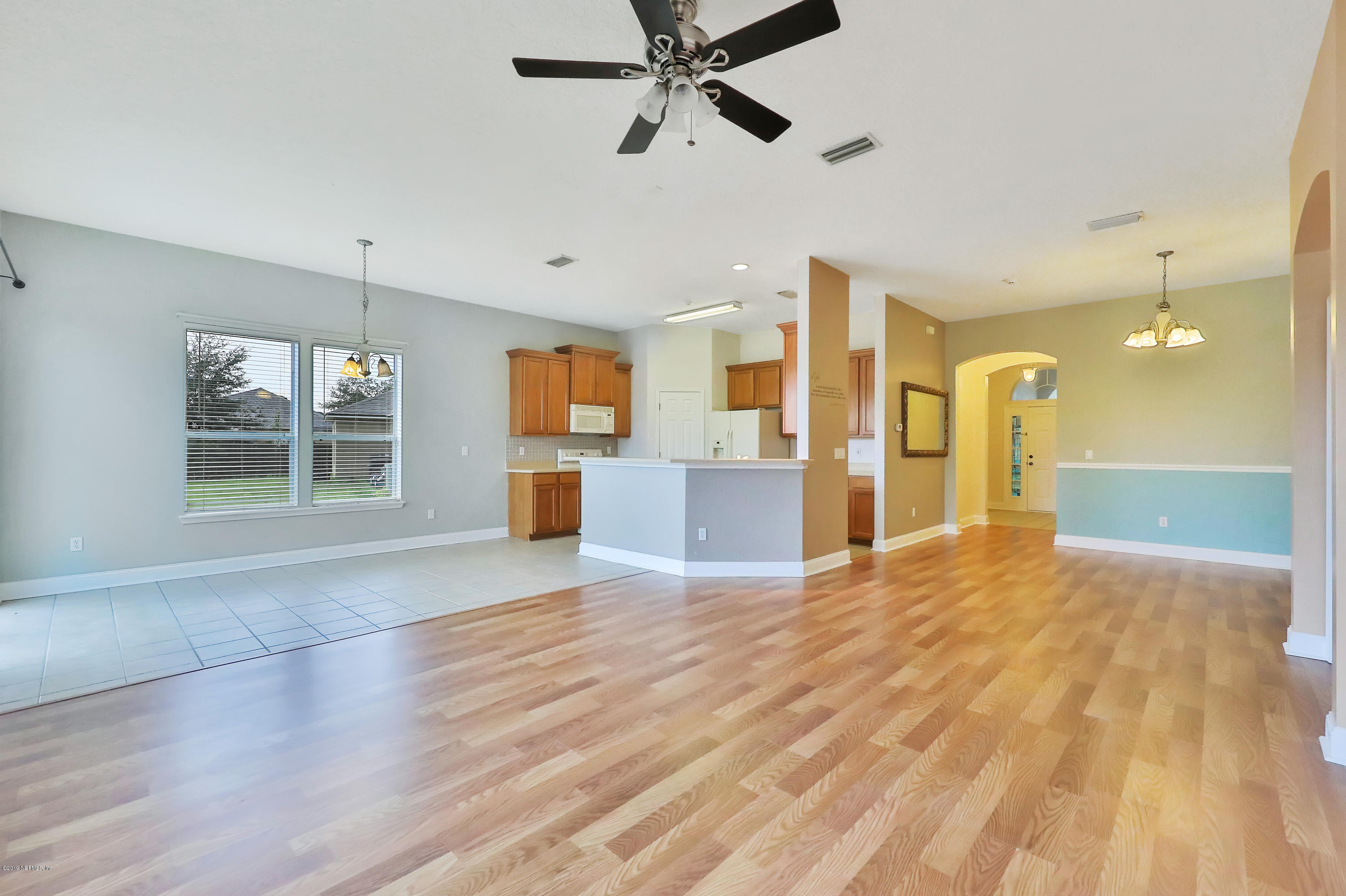 9189 Raptor Drive Jacksonville, FL 32221 - Photo 12 of 23 a view of a kitchen with a sink and a window