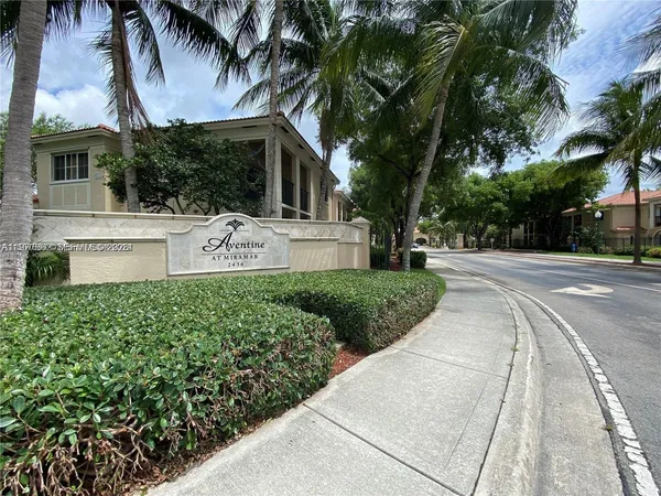 a view of balcony with wooden floor and city view