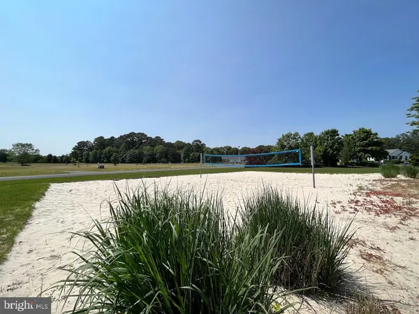 a view of lake with green space