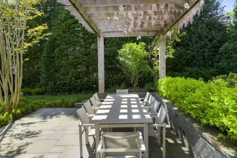 a view of yard with patio