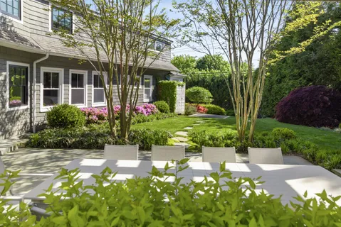 a view of a garden with a flower garden