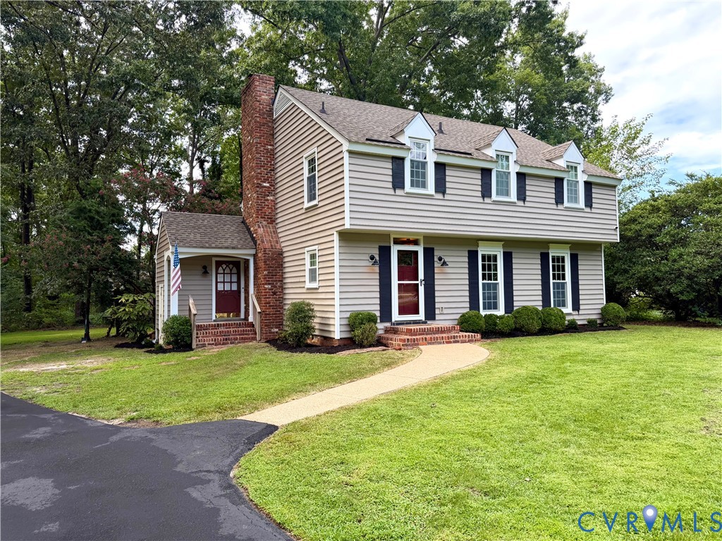 3670 Hemlock Road Chester, VA 23831 - Photo 1 of 4 Two-story colonial exterior with light-colored sid