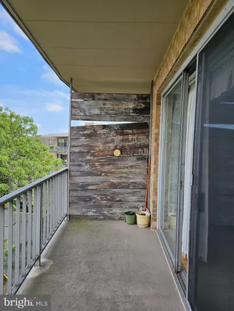 a view of outdoor space and wooden door