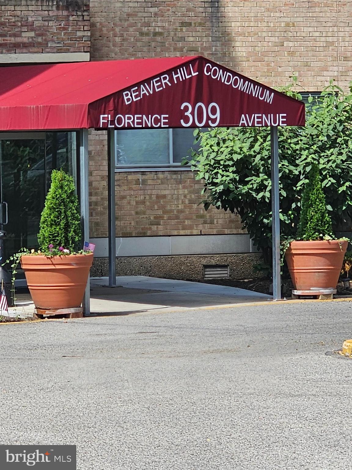 309 Florence Avenue, Unit 627N Jenkintown, PA 19046 - Photo 2 of 35 a sign that is sitting in front of a building