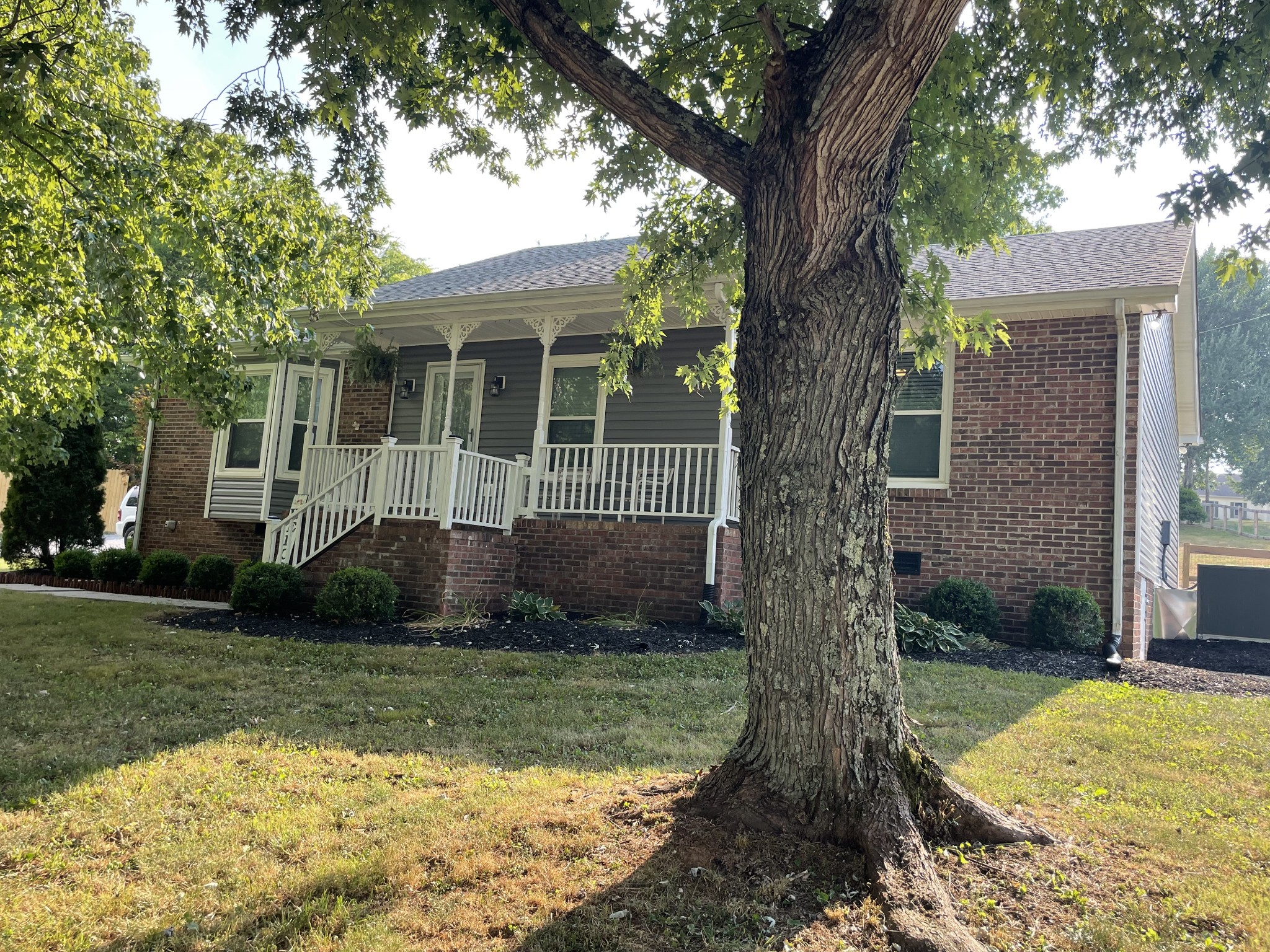 2768 Henry Gower Road Pleasant View, TN 37146 - Photo 2 of 45 front view of a house with a yard