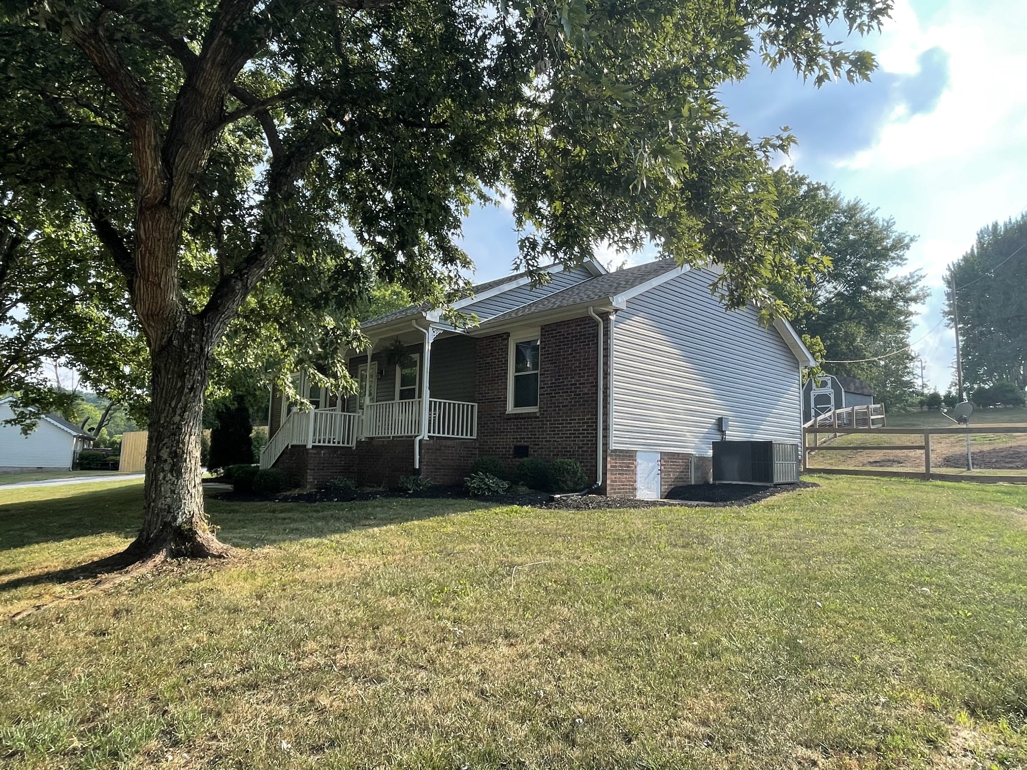 2768 Henry Gower Road Pleasant View, TN 37146 - Photo 6 of 45 a view of a house with a yard