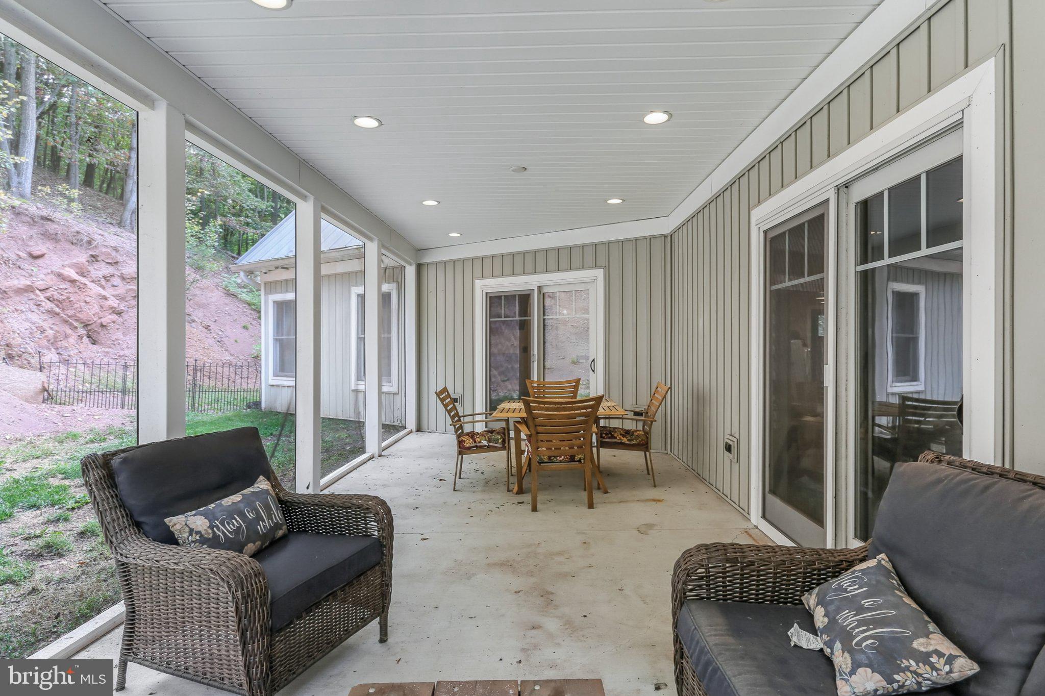 6 Maple Grove Road Mohnton, PA 19540 - Photo 43 of 55 Serene screened porch for relaxation.
