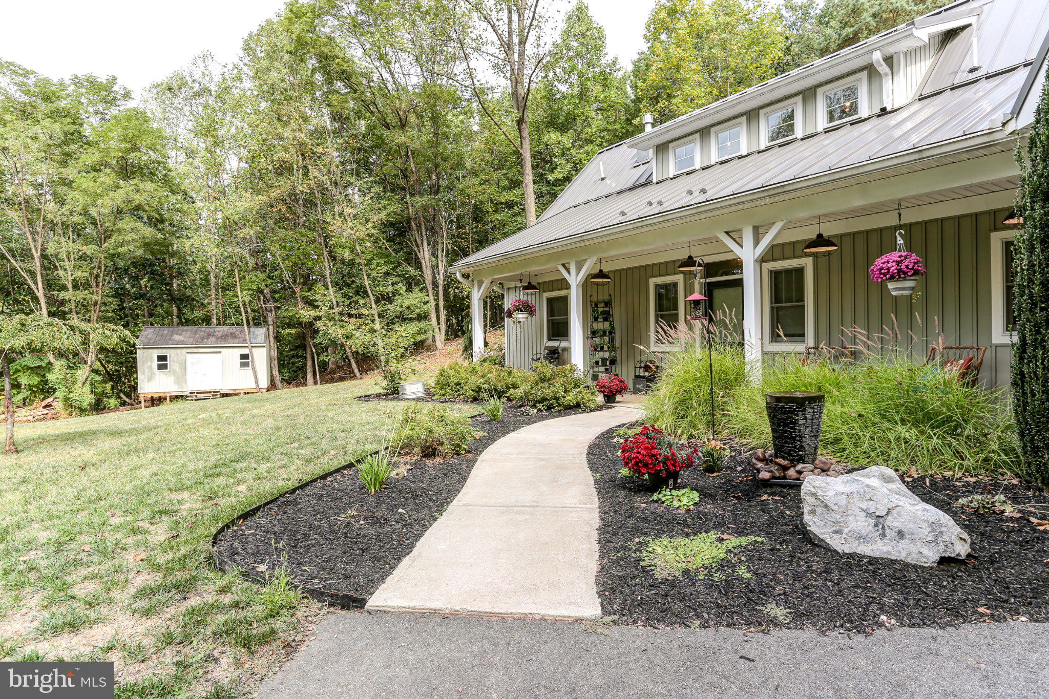 6 Maple Grove Road Mohnton, PA 19540 - Photo 45 of 55 Charming home with lush garden path.