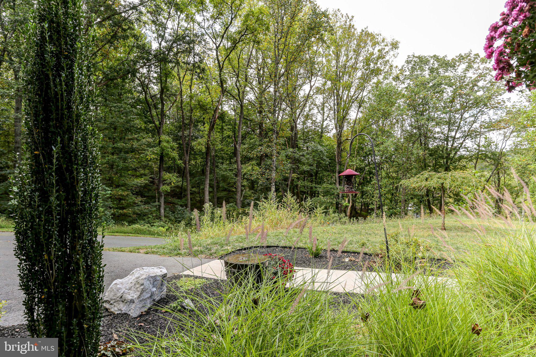 6 Maple Grove Road Mohnton, PA 19540 - Photo 52 of 55 Serene garden retreat in nature's embrace.