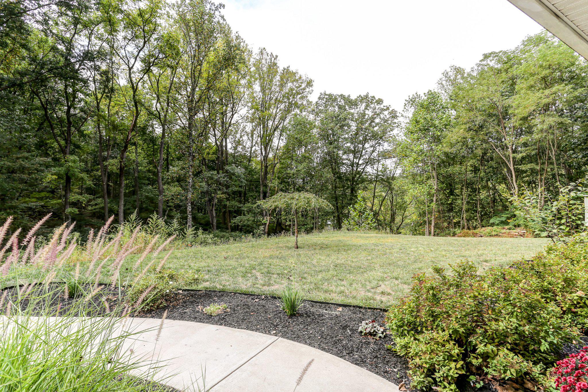 6 Maple Grove Road Mohnton, PA 19540 - Photo 53 of 55 Serene front yard with lush greenery.