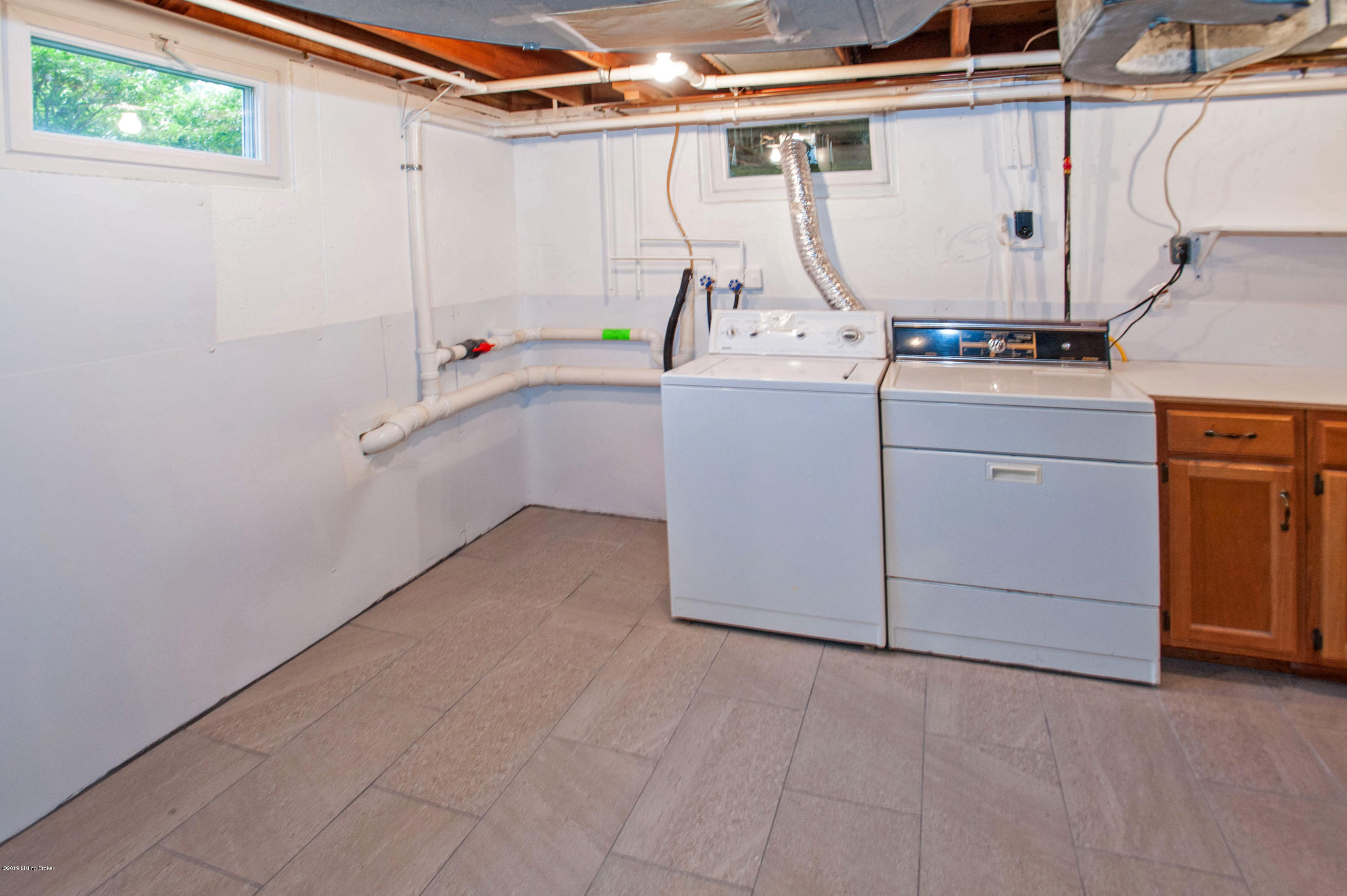 211 Brunswick Road Louisville, KY 40207 - Photo 22 of 36 Tiled Laundry Area