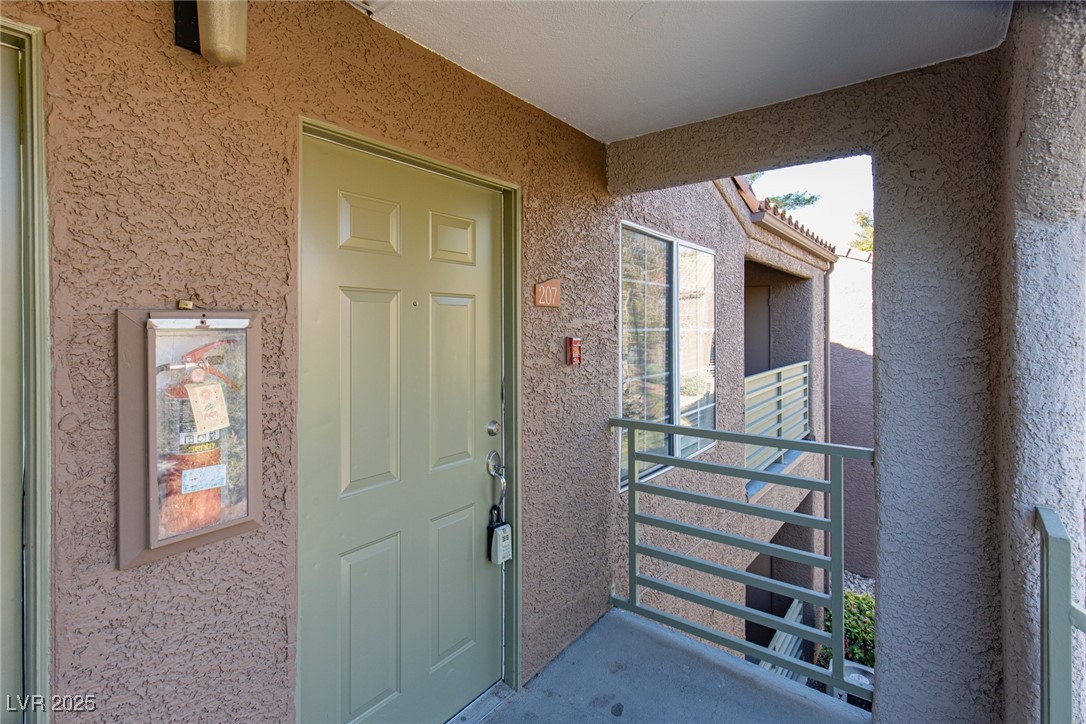 7720 Secret Shore Drive, Unit 207 Las Vegas, NV 89128 - Photo 10 of 21 Entrance to property.