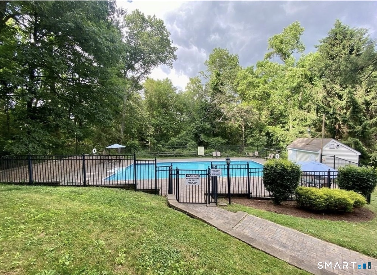 175 Mill Pond Road, Unit 106 Hamden, CT 06514 - Photo 22 of 22 a view of house with a yard