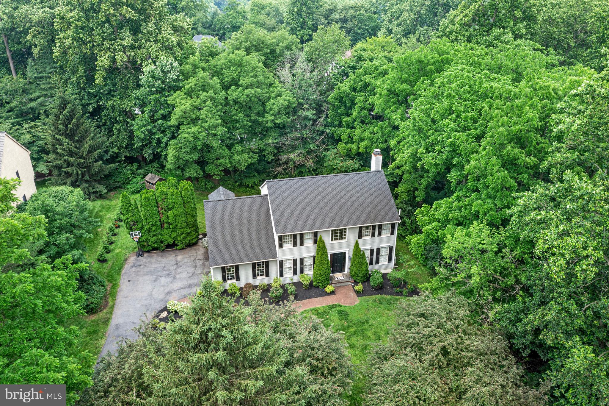 427 Buttonwood Road Landenberg, PA 19350 - Photo 1 of 82 an aerial view of a house with yard and trees in the back
