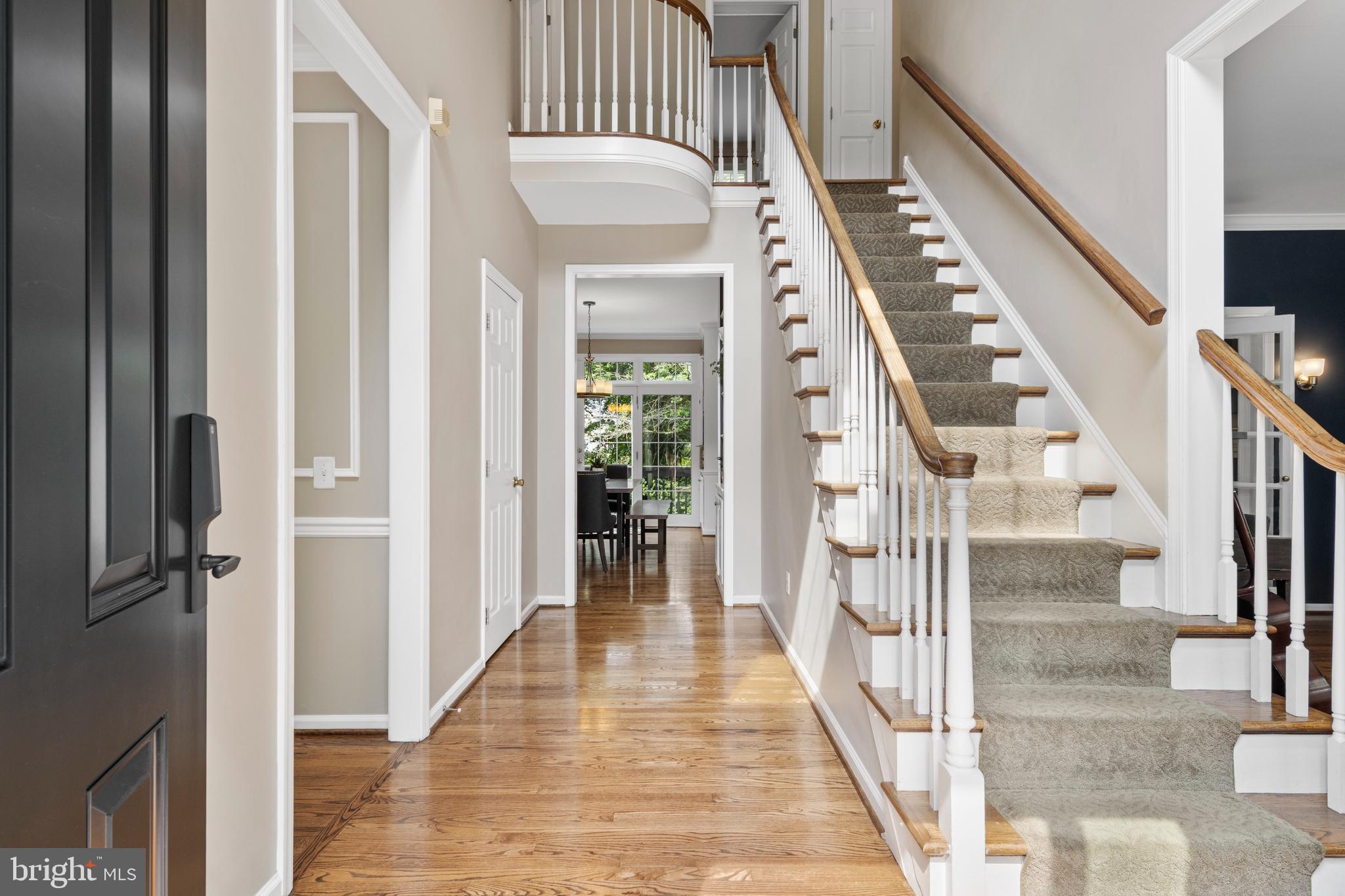 427 Buttonwood Road Landenberg, PA 19350 - Photo 14 of 82 a view of a hallway with wooden floor and staircase