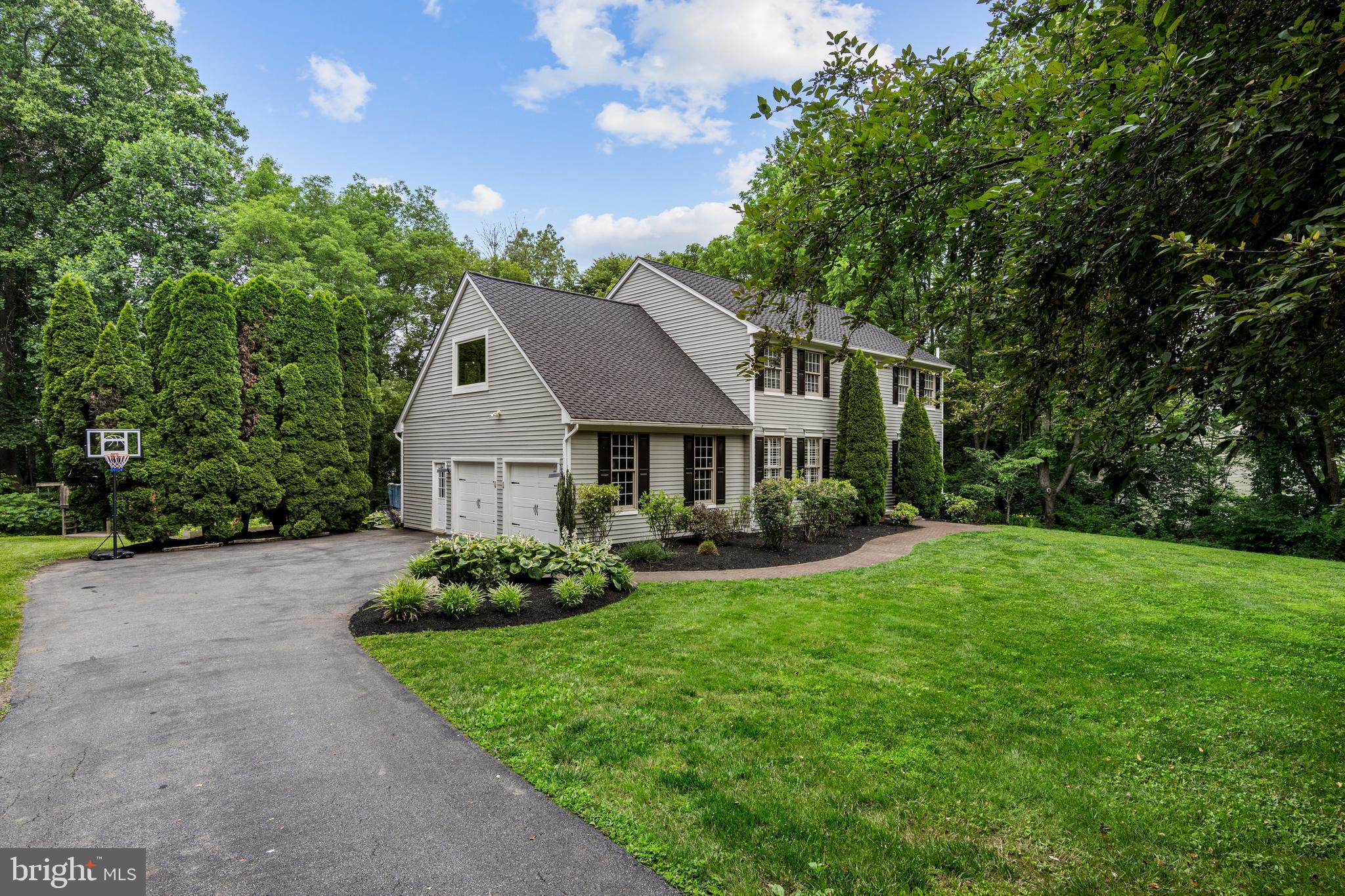 427 Buttonwood Road Landenberg, PA 19350 - Photo 4 of 82 a front view of a house with garden