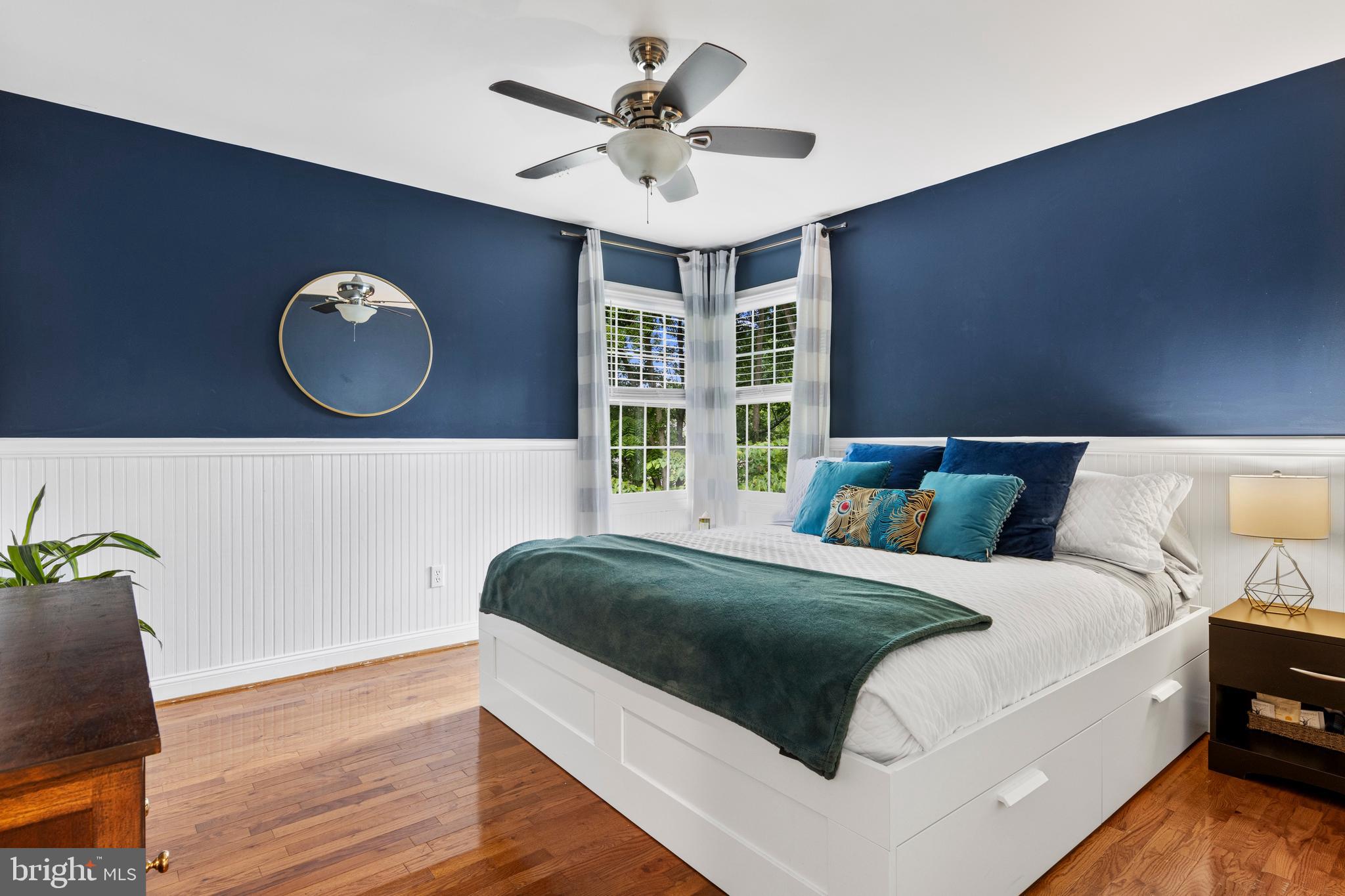 427 Buttonwood Road Landenberg, PA 19350 - Photo 48 of 82 a bedroom with a bed and a potted plant