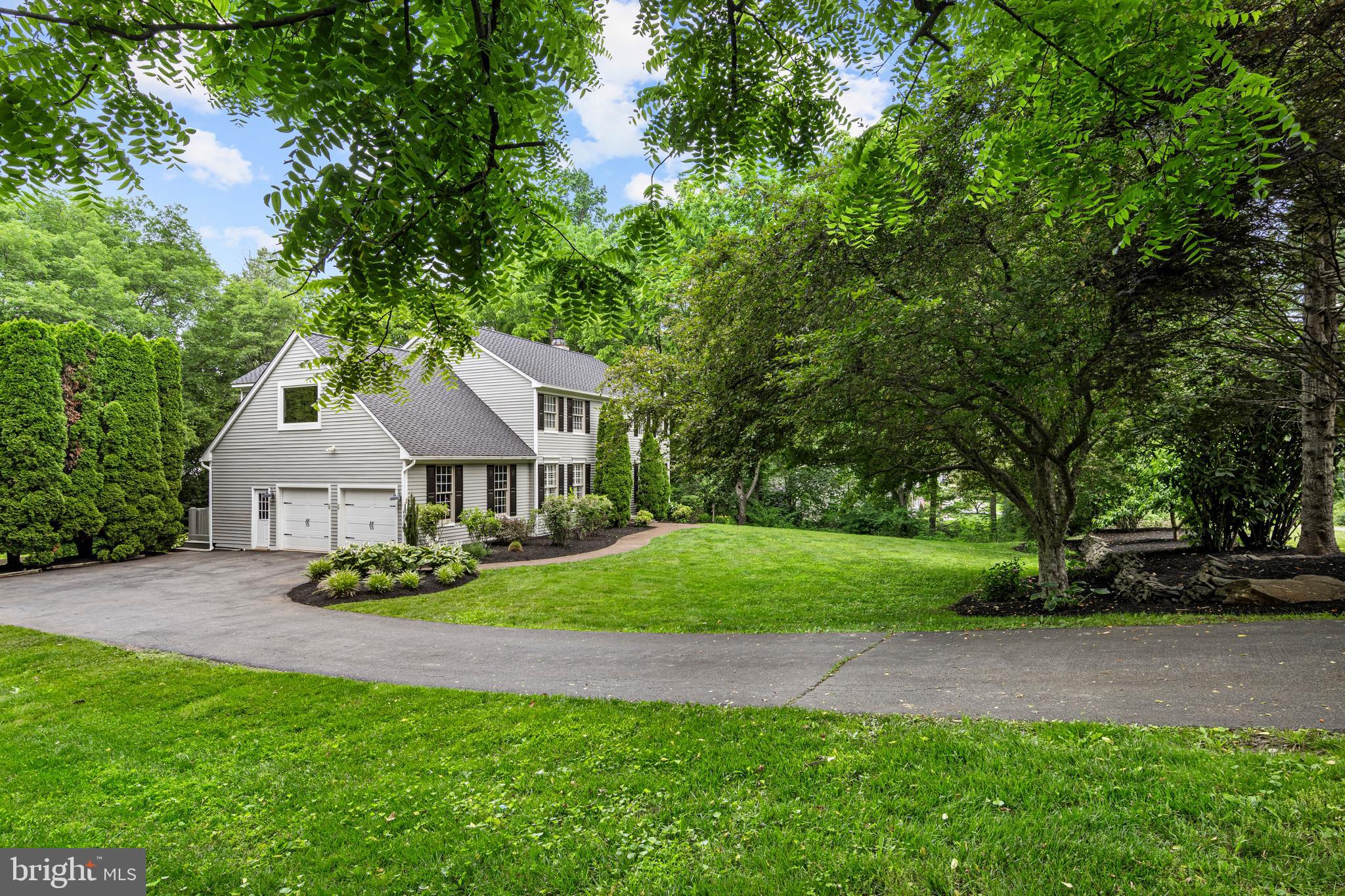 427 Buttonwood Road Landenberg, PA 19350 - Photo 5 of 82 a front view of a house with a garden