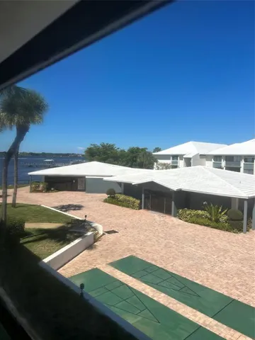 a view of swimming pool with a yard