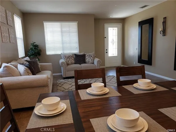 a living room with furniture and a couch