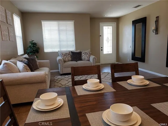 a living room with furniture and a couch