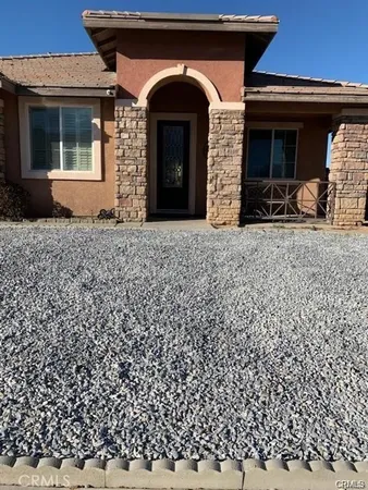 a view of a house with a large windows