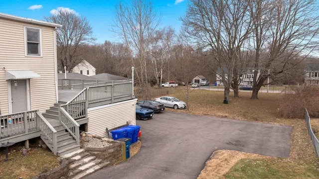 a view of a kitchen with microwave and cabinets