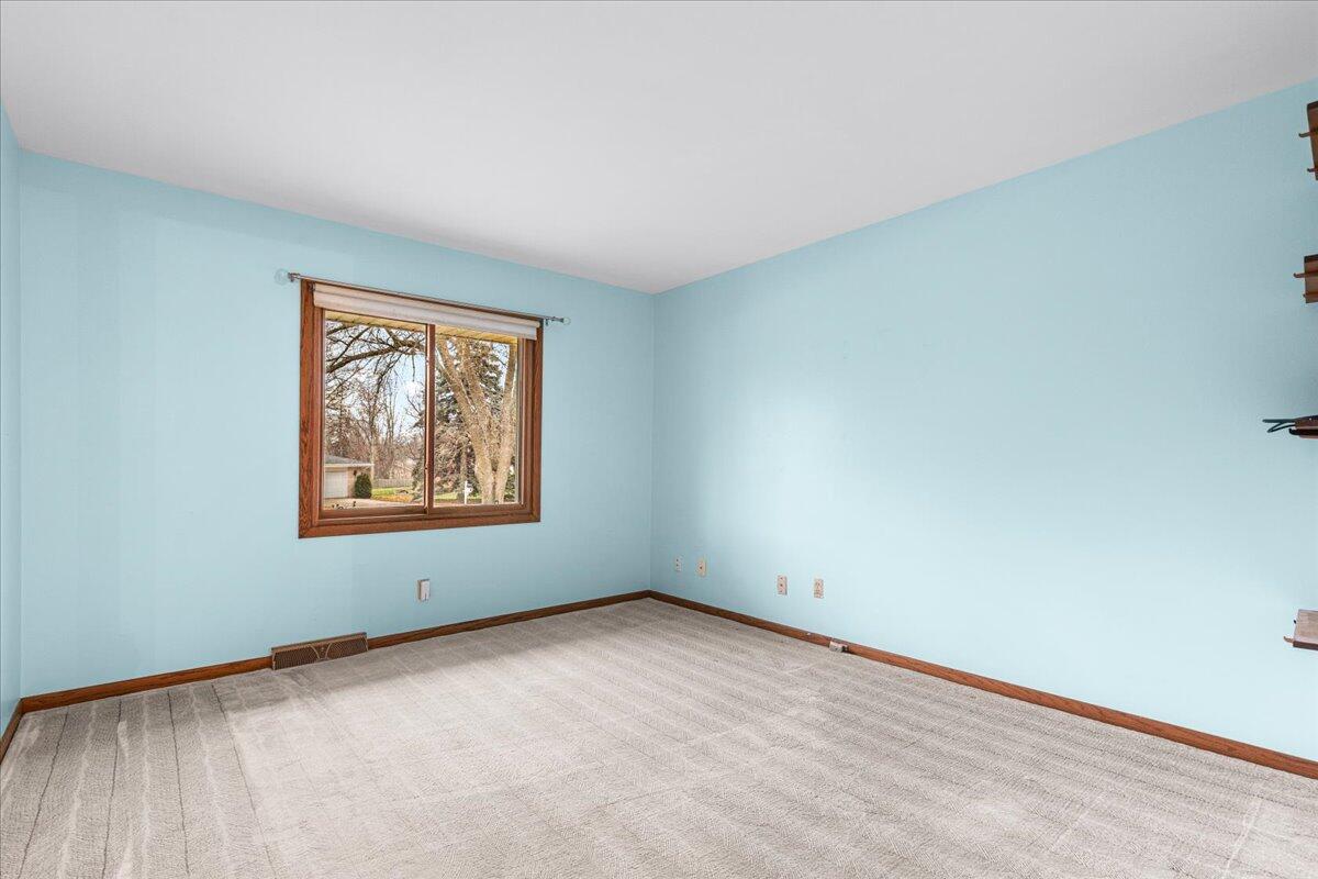 7525 North Redwood Road Glendale, WI 53209 - Photo 13 of 29 12'9" x 11'6" Bedroom