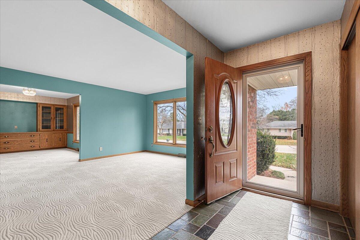 7525 North Redwood Road Glendale, WI 53209 - Photo 2 of 29 Inviting Slate Floor Entryway