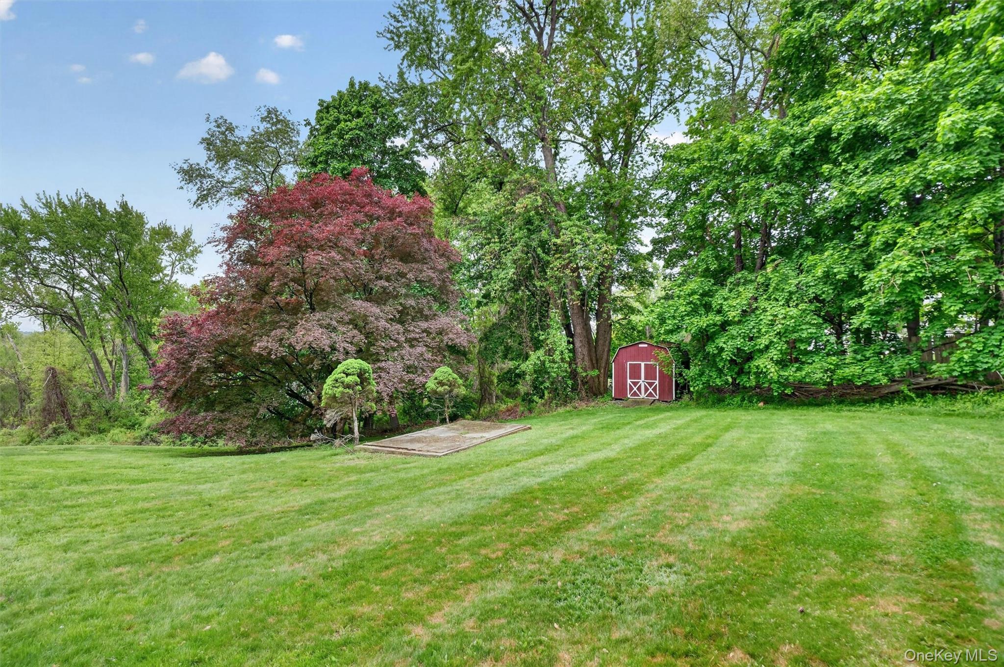 10 Edwin Road Poughkeepsie, NY 12603 - Photo 33 of 46 a view of a garden with a building