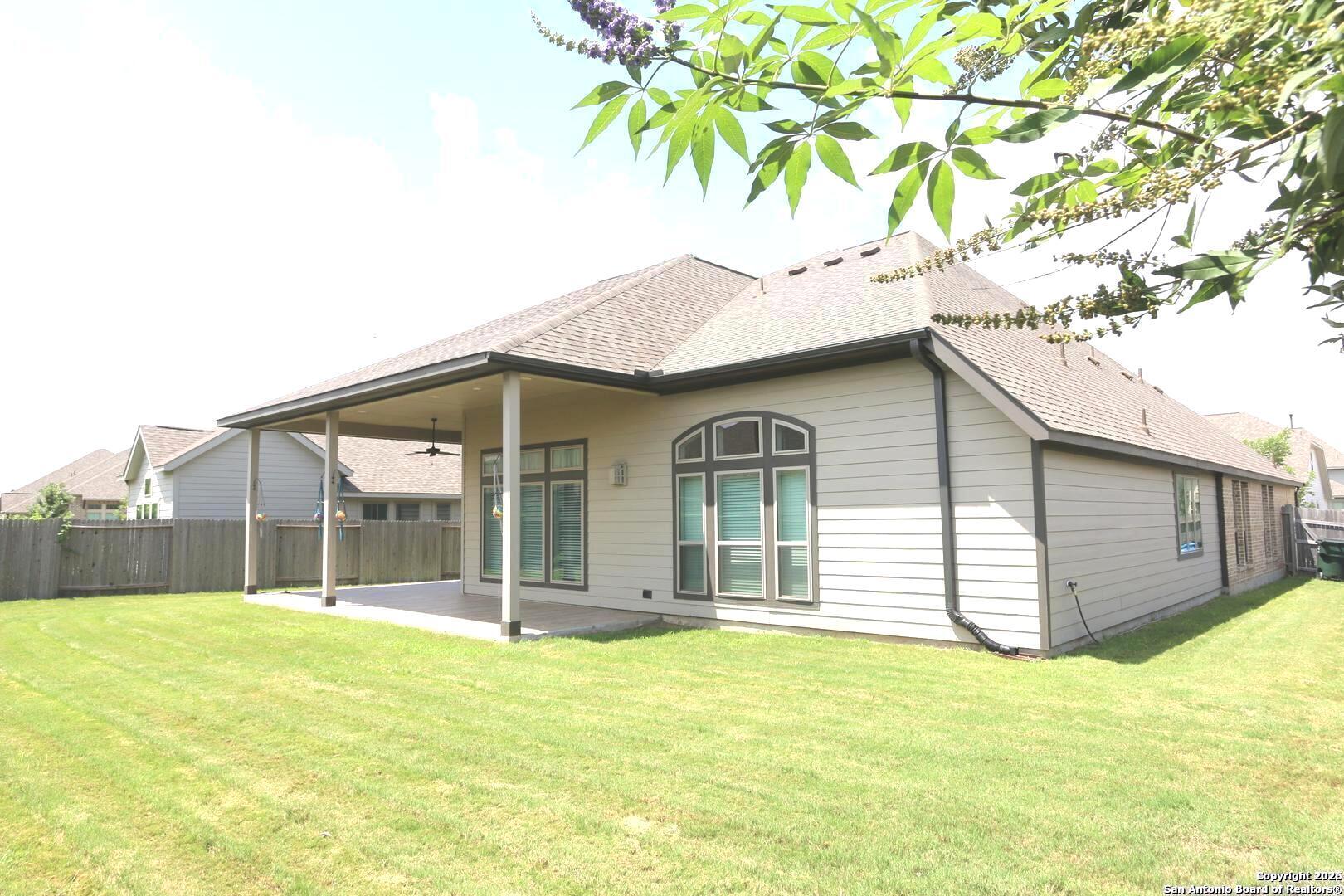 2965 Grove Way Seguin, TX 78155 - Photo 2 of 60 a house view with a garden space