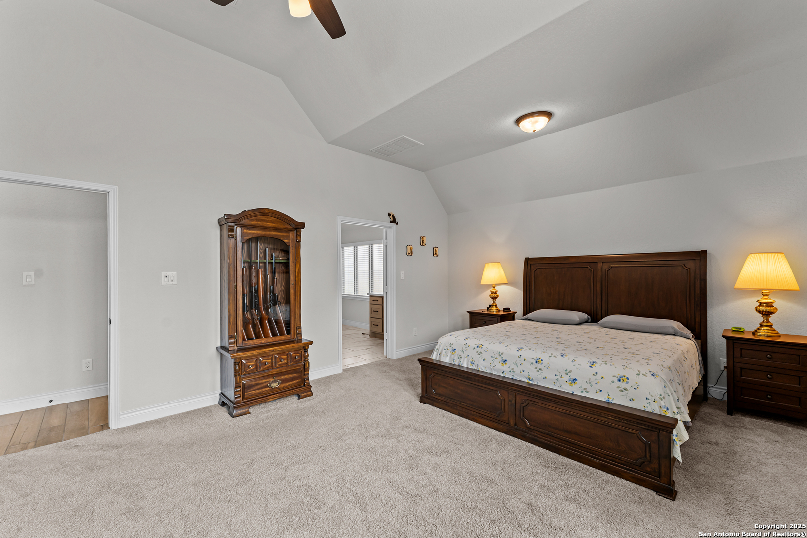 2965 Grove Way Seguin, TX 78155 - Photo 48 of 60 a bedroom with a bed and lamp