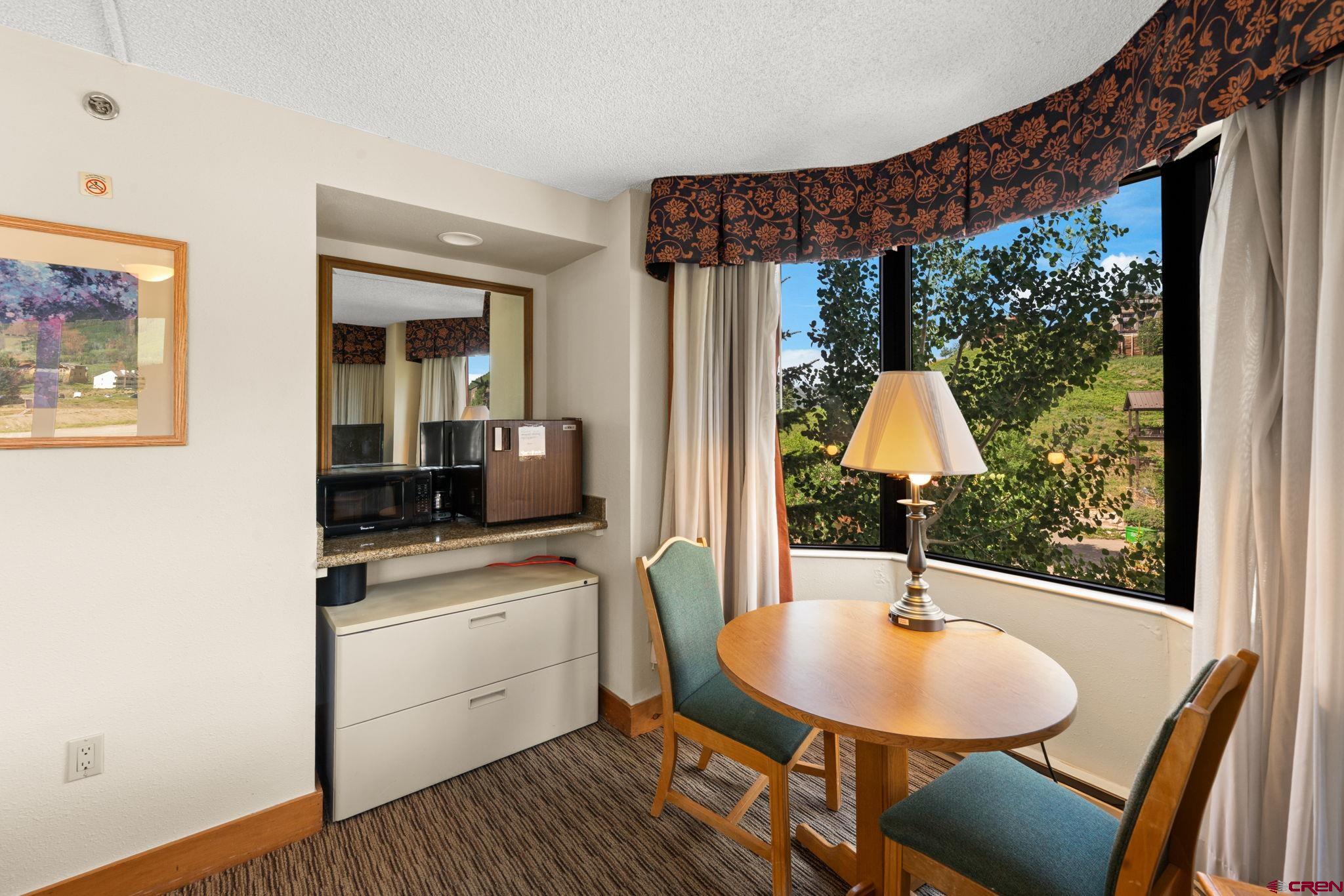 6 Emmons Road, Unit 452 & 454 Crested Butte, CO 81225 - Photo 15 of 38 a bathroom with a sink and a mirror