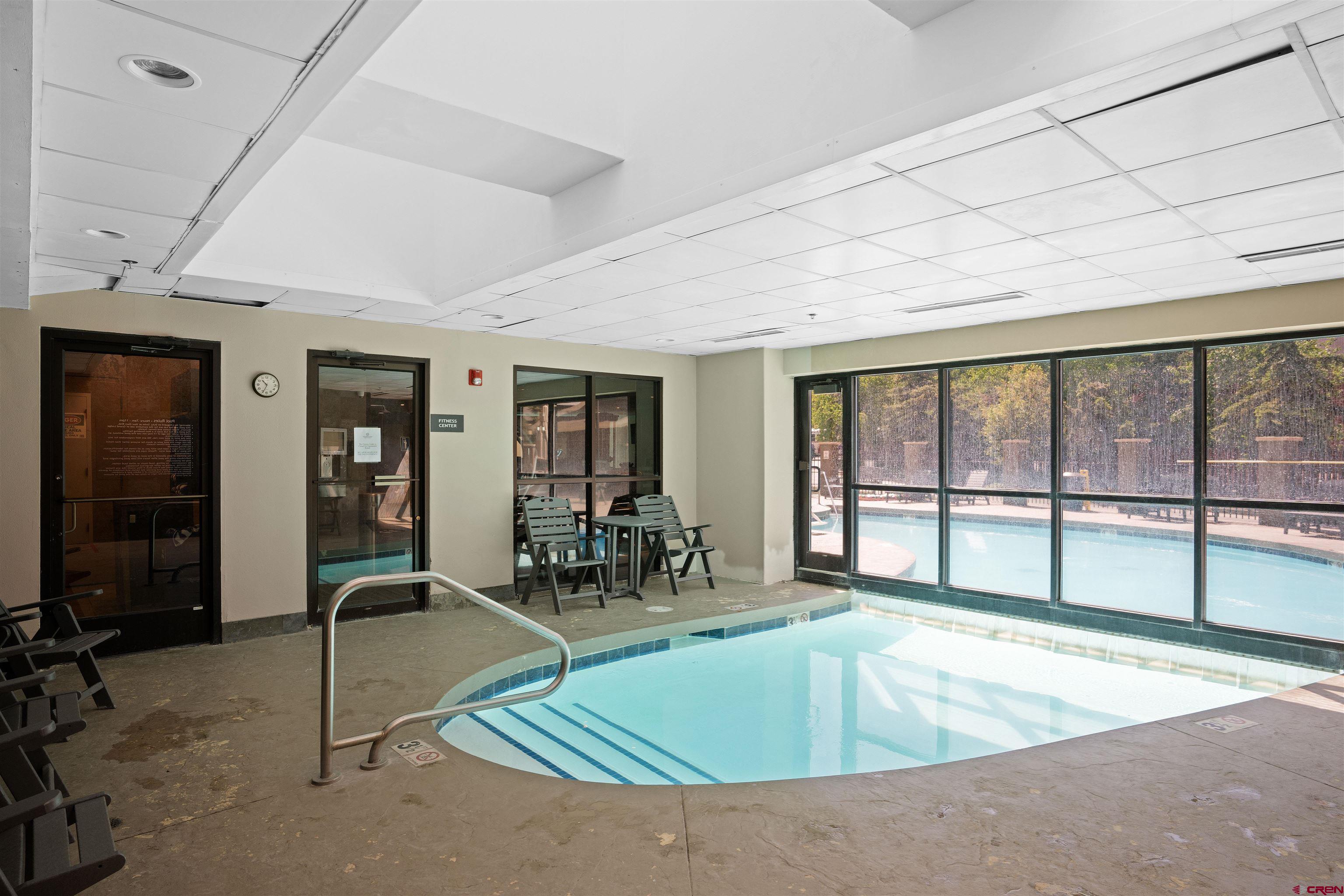 6 Emmons Road, Unit 452 & 454 Crested Butte, CO 81225 - Photo 35 of 38 a room with pool table and windows
