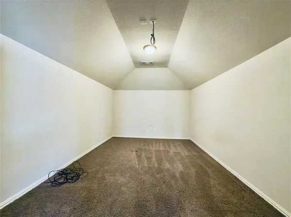 a spacious bathroom with a double vanity sink toilet mirror and bathtub
