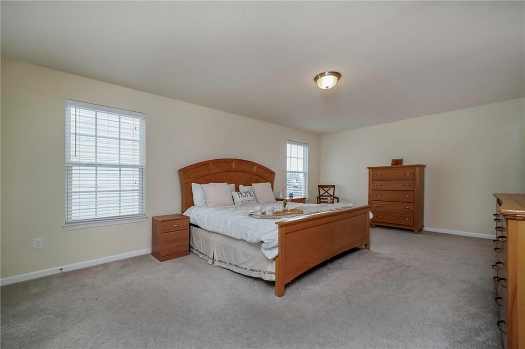 171 Cimarron Drive Moon Township, PA 15108 - Photo 12 of 25 a living room with furniture and a window