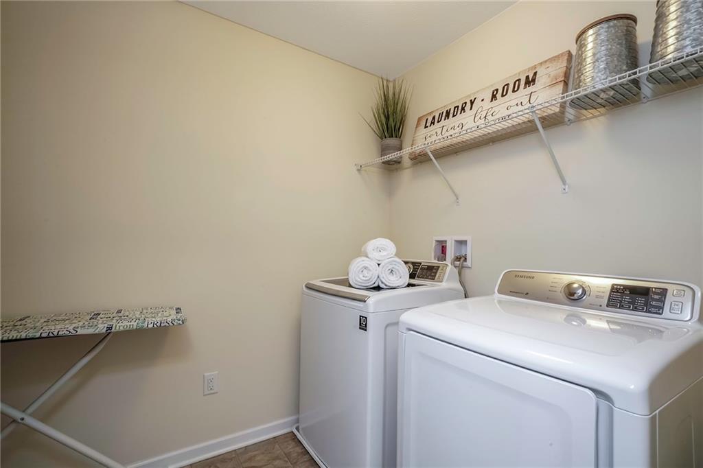171 Cimarron Drive Moon Township, PA 15108 - Photo 16 of 25 a utility room with dryer and washer
