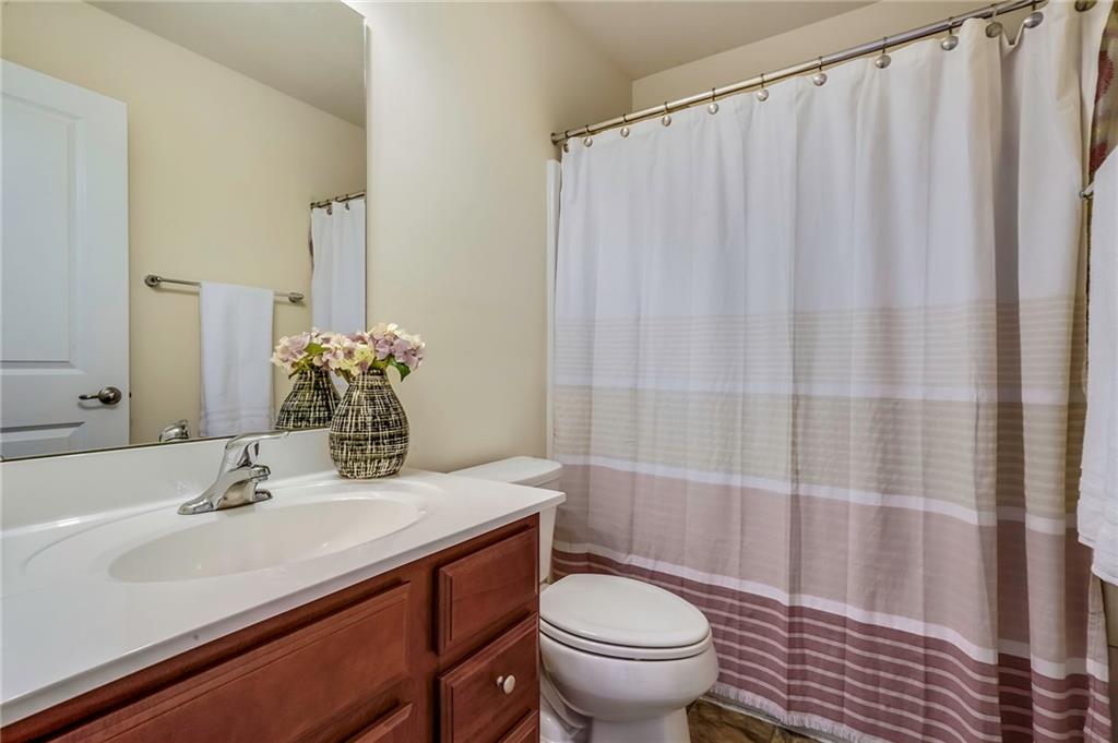 171 Cimarron Drive Moon Township, PA 15108 - Photo 20 of 25 a bathroom with a sink and toilet