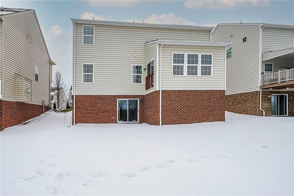 171 Cimarron Drive Moon Township, PA 15108 - Photo 25 of 25 a view of an empty room with furniture and window