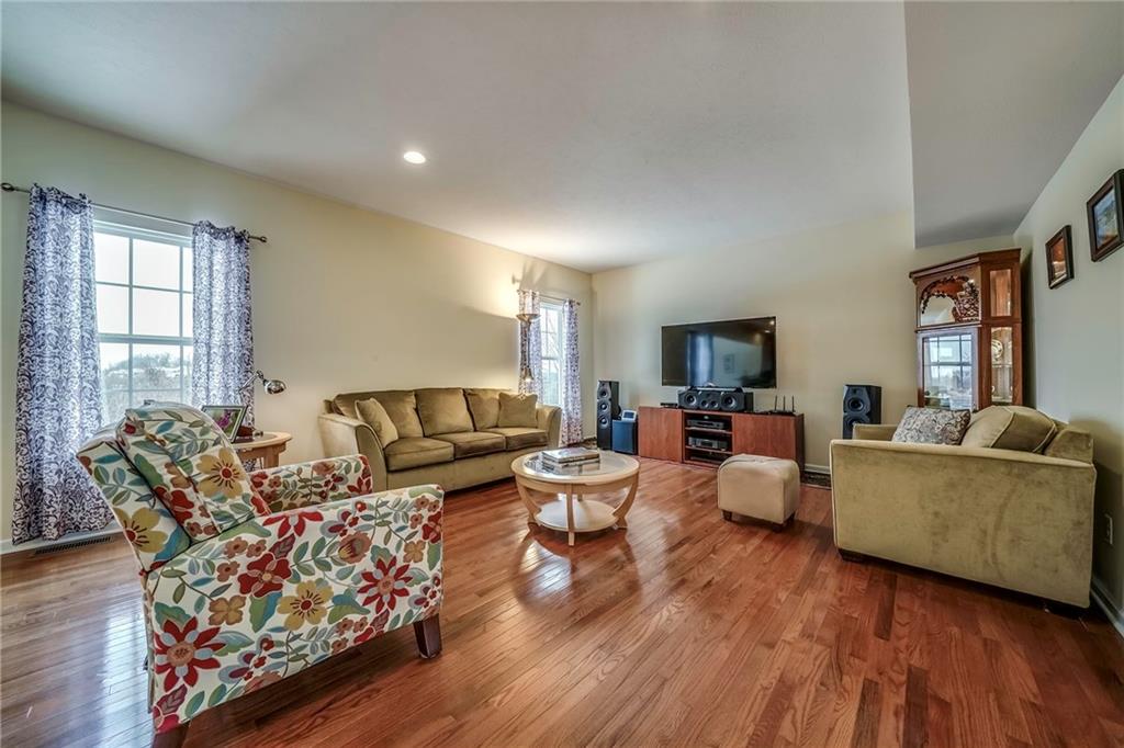 171 Cimarron Drive Moon Township, PA 15108 - Photo 4 of 25 a living room with furniture and wooden floor