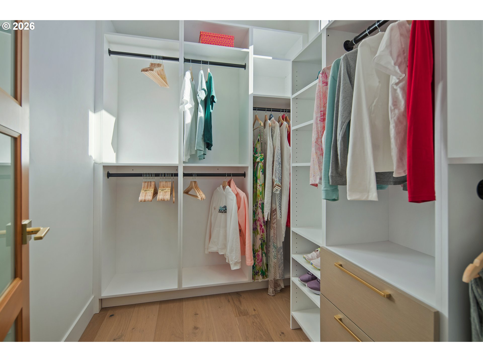 3403 Northeast Johns Loop Neotsu, OR 97364 - Photo 26 of 48 a view of walk in closet with clothes and shoes