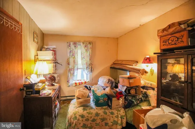 a view of a livingroom with furniture and windows