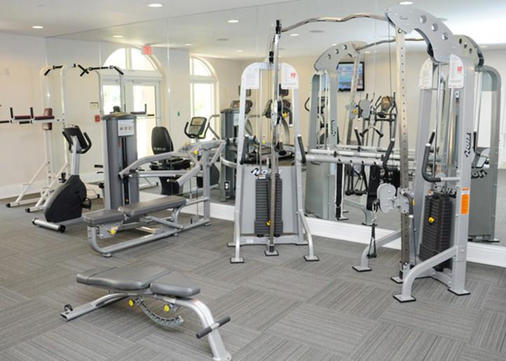 9357 Southwest 77th Avenue, Unit 853033 Miami, FL 33156 - Photo 14 of 17 a view of a room with gym equipment