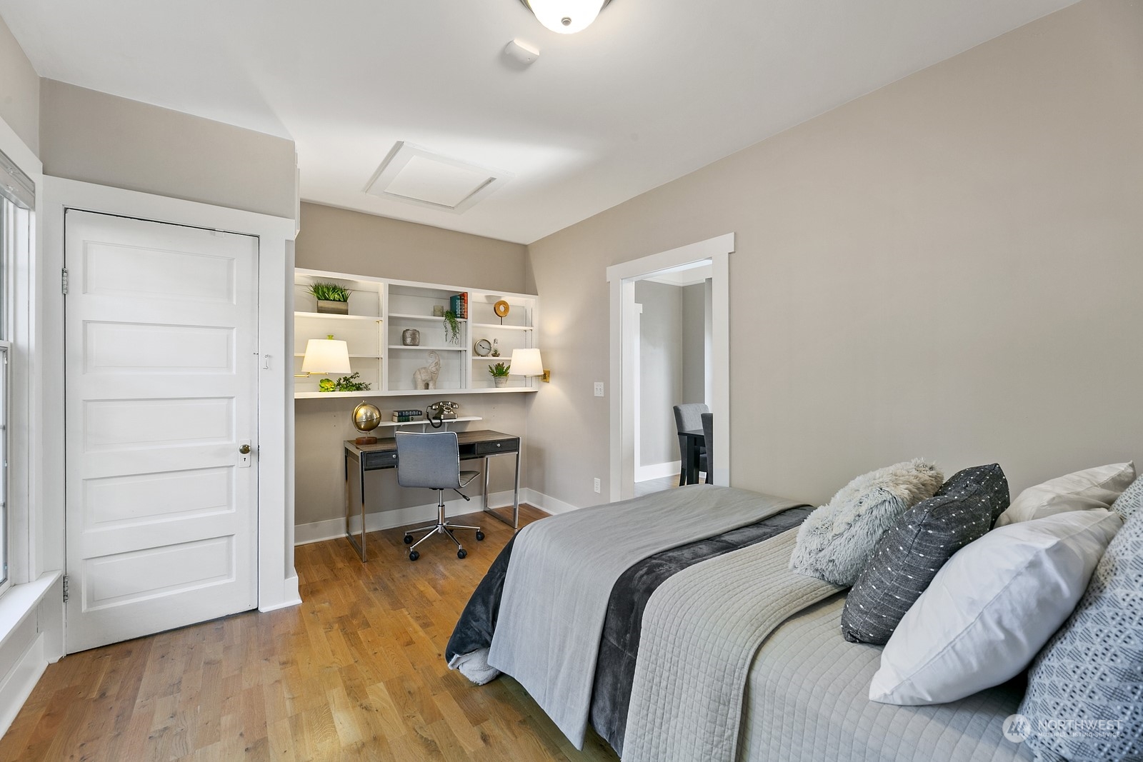 8053 12th Avenue Northeast Seattle, WA 98115 - Photo 12 of 27 a bedroom with a bed and furniture