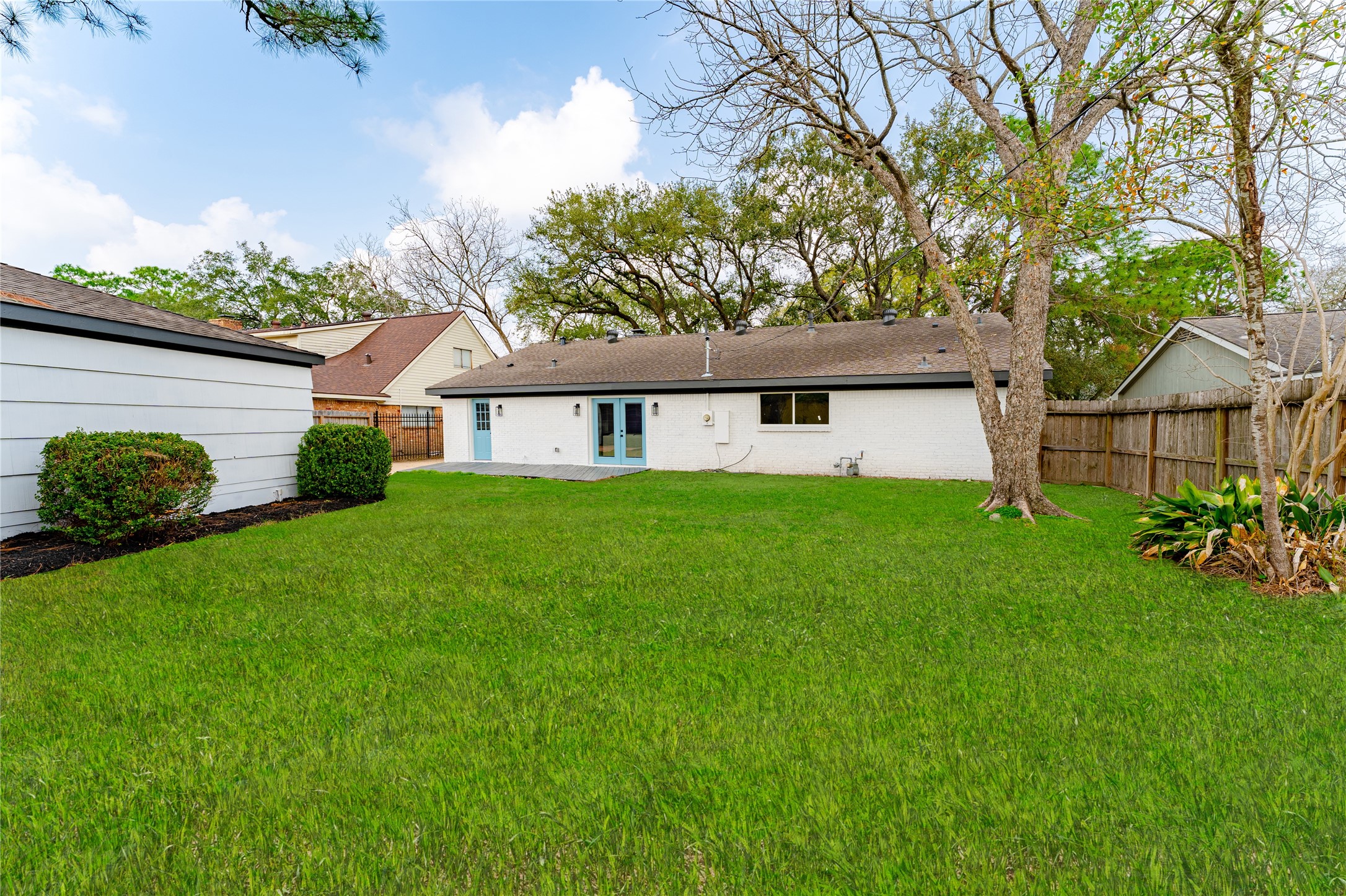 6027 Valkeith Drive Houston, TX 77096 - Photo 30 of 31 a front view of a house with garden