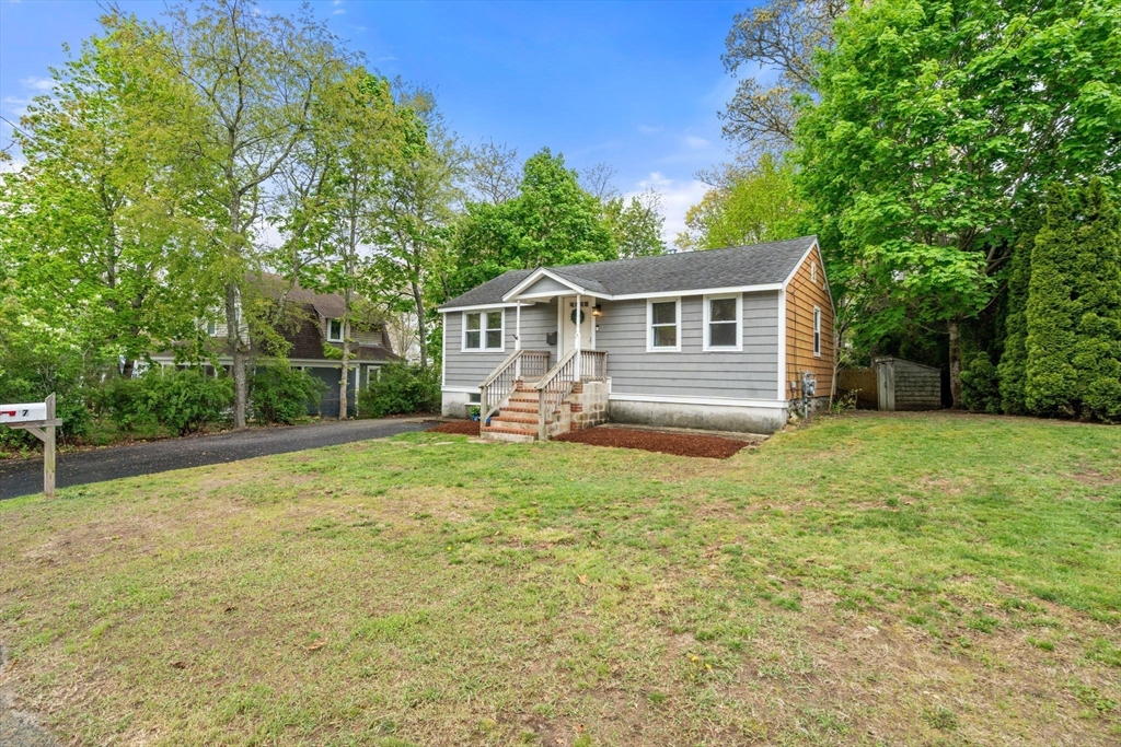 7 Indian Neck Road Wareham, MA 02571 - Photo 3 of 34 a view of a house with backyard and a garden